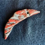 Verwendung der Brosche Reptil KKK